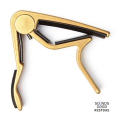 DUNLOP 83CG TRIGGER CAPO ACOUSTIC CURVED GOLD